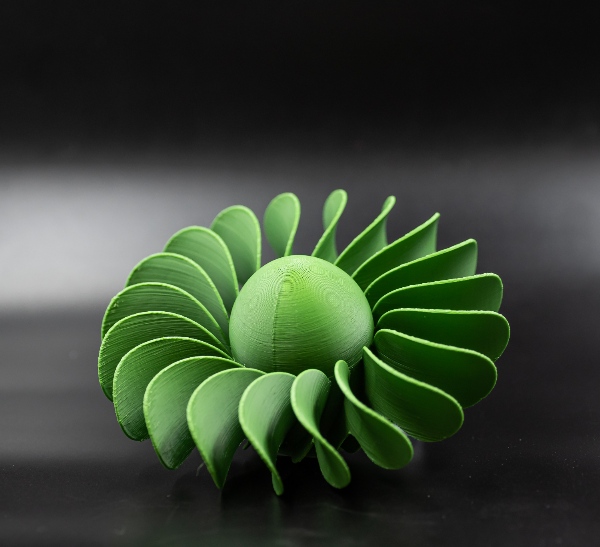 Pièce plastique verte hélice en impression 3D 